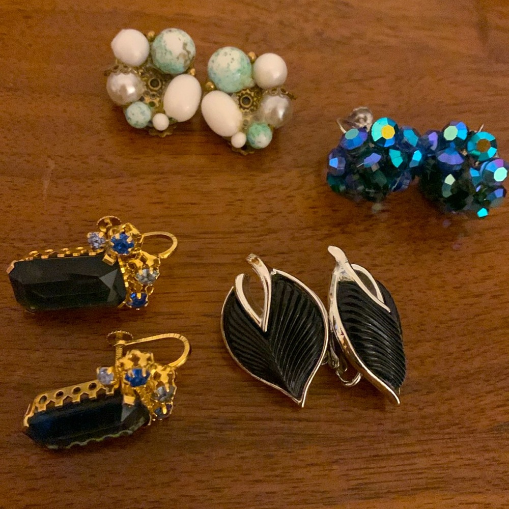 Four pair of antique clip on earrings. Elegant costume jewelry.